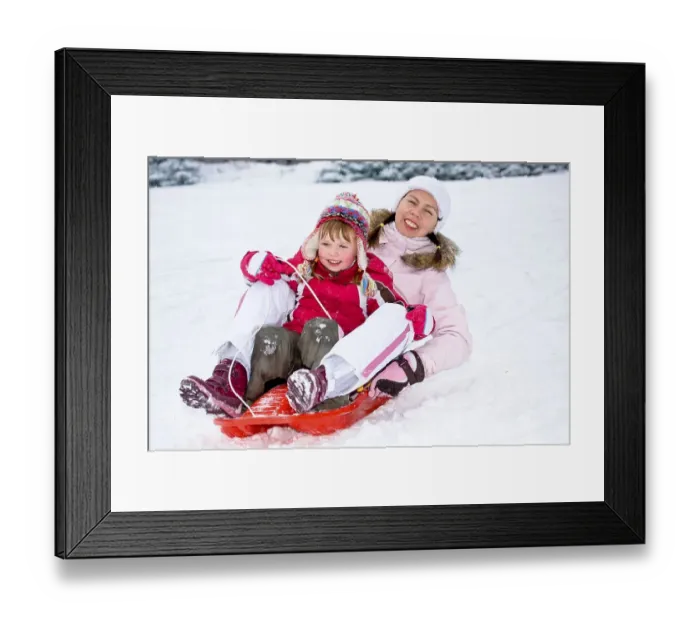 Framed Print : Sledding mother and daughter Framed Print : Sledding mother and daughter