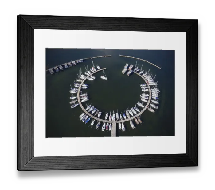 Framed Print : Aerial view over sailing boats docked in the Burgtiefe marina at on Fehmarn Framed Print : Aerial view over sailing boats docked in the Burgtiefe marina at on Fehmarn