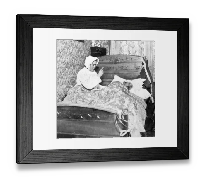 Framed Print : Historic photograph, woman scolding her husband in bed