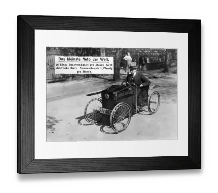 Framed Print : Historic photo, smallest car in the world