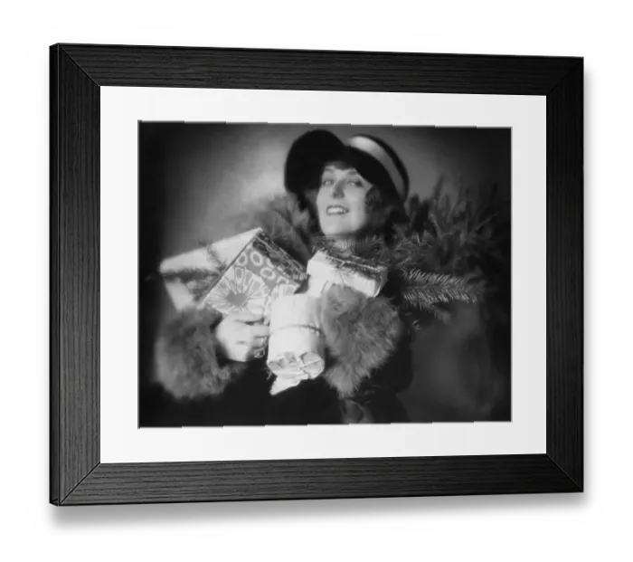 Framed Print : Historic photograph, woman with Christmas presents