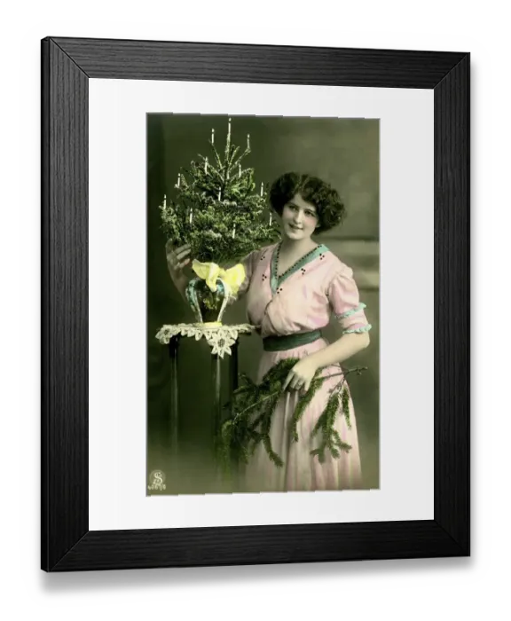 Framed Print : Historical photo, woman with Christmas tree