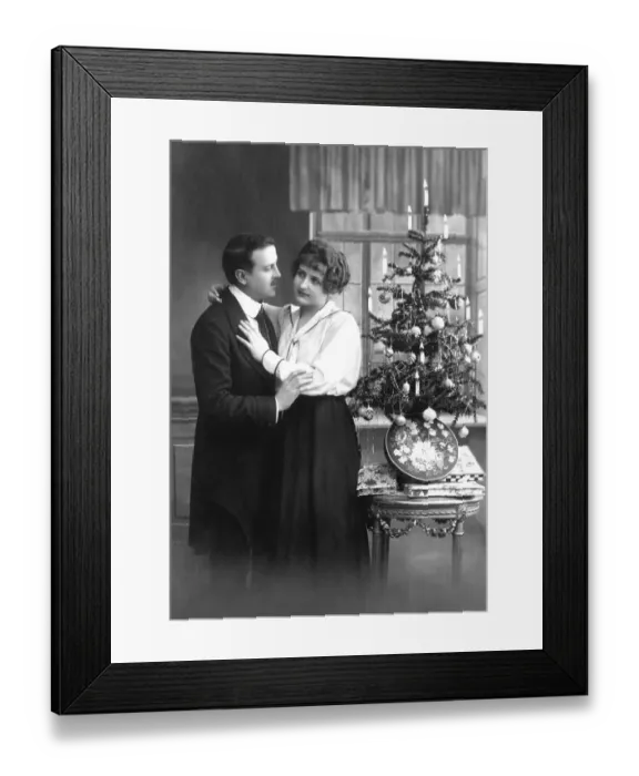 Framed Print : Historical photo, couple with Christmas tree