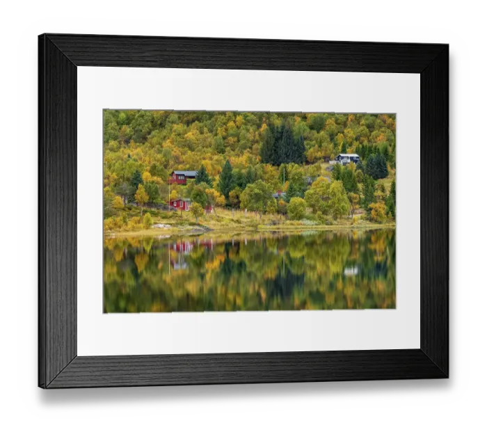 Framed Print : Houses in autumnal forest reflected in the lake Framed Print : Houses in autumnal forest reflected in the lake