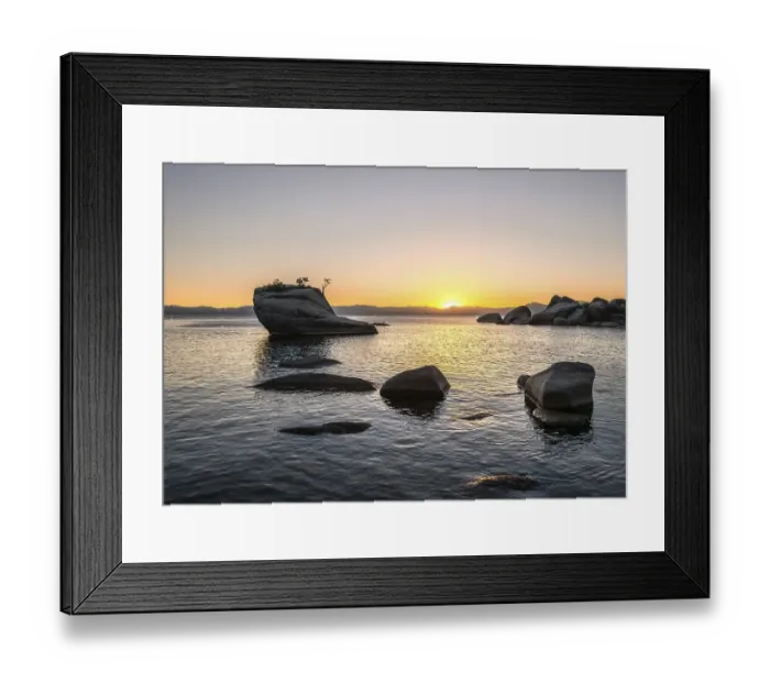 Framed Print : View of Bonsai Rock, small tree on a rock in the water at sunset