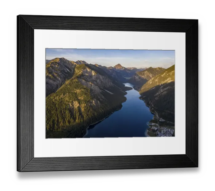 Framed Print : View from the summit of Schoenjoechl to Plansee and mountains at morning sun
