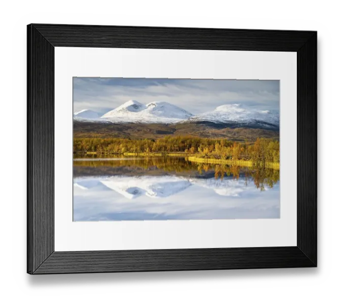 Framed Print : Snowy mountains in Abisko National Park reflected in lake Vuolio Njahkajavri