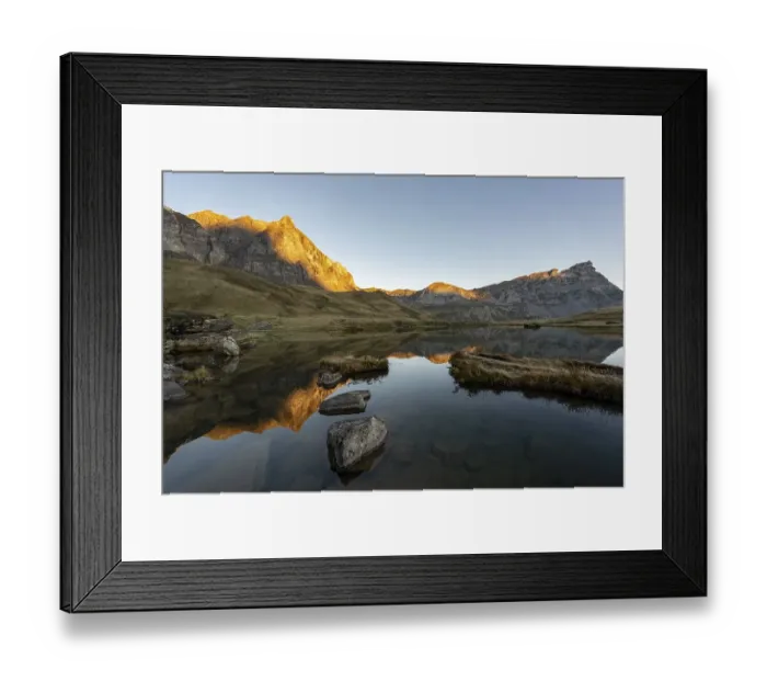 Framed Print : The Blue Lake at sunrise near Melchsee-Frutt on the Aa Alp in the Melch Valley