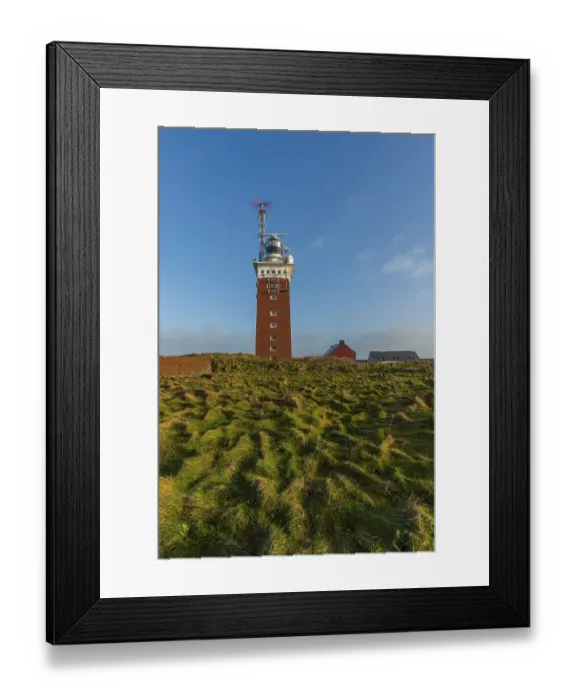 Framed Print : Brick lighthouse with radar antenna
