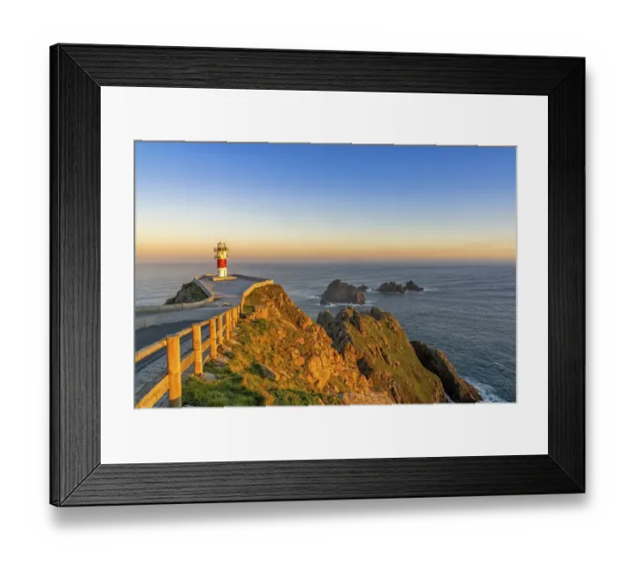 Framed Print : the Cabo Ortegal lighthouse on the coast of Galicia at sunrise Framed Print : the Cabo Ortegal lighthouse on the coast of Galicia at sunrise