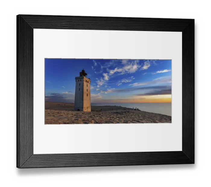 Framed Print : The Rubjerg Knude Fyr lighthouse near Lokken in Denmark in the light of sunset Framed Print : The Rubjerg Knude Fyr lighthouse near Lokken in Denmark in the light of sunset
