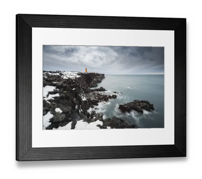 Framed Print : Orange lighthouse Oendverdarnes stands on a dark cliff Framed Print : Orange lighthouse Oendverdarnes stands on a dark cliff