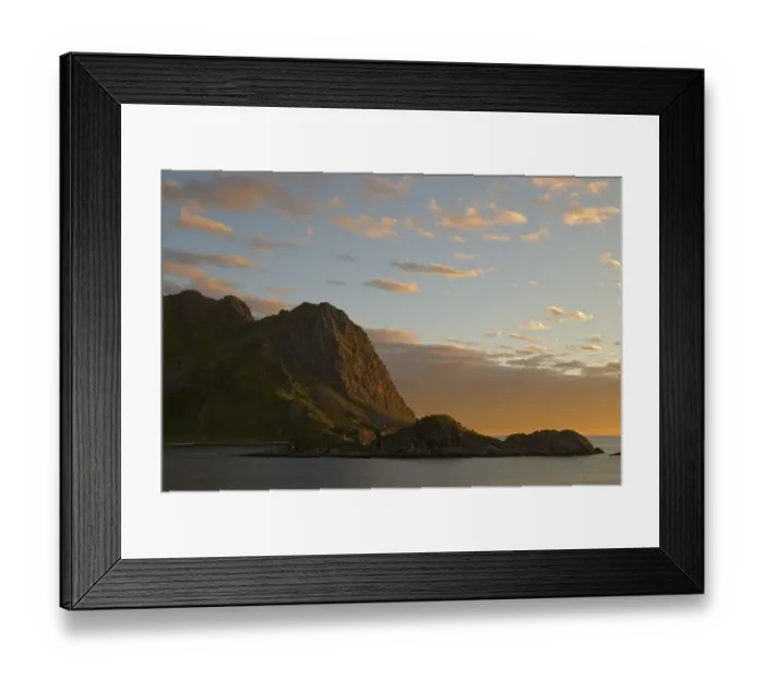 Framed Print : Mountains and the Norwegian Sea near Straume illuminated by warm evening light on the island of Langoya