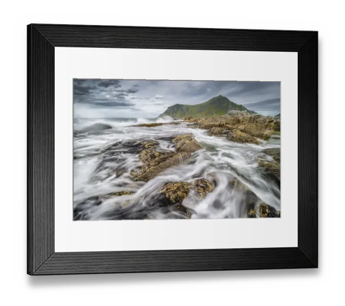 Framed Print : Rocks and wild sea surf, on the beach at Flakstad