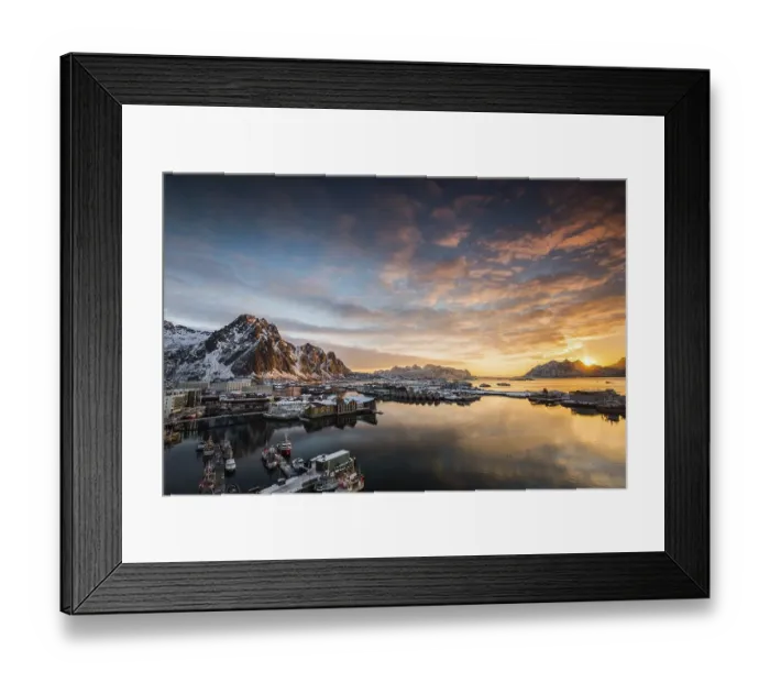 Framed Print : View over the port of Svolvaer on the Lofoten islands in colorful early morning sunrise in winter with snow