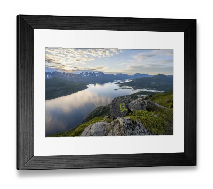 Framed Print : Sun star at sunset over the mountain peaks
