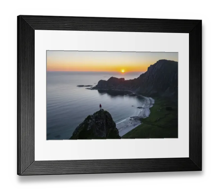 Framed Print : Sunset, hiker on rocks, cliffs