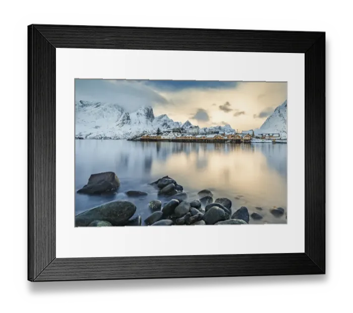 Framed Print : Town and fisherman's cabins or Rorbus in front of snowy mountains Framed Print : Town and fisherman's cabins or Rorbus in front of snowy mountains