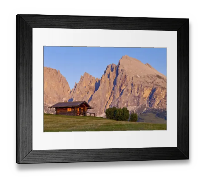 Framed Print : Hut on the Seiser Alm alpine meadow with a view towards Sasso Lungo and Sasso Piatto mountains Framed Print : Hut on the Seiser Alm alpine meadow with a view towards Sasso Lungo and Sasso Piatto mountains