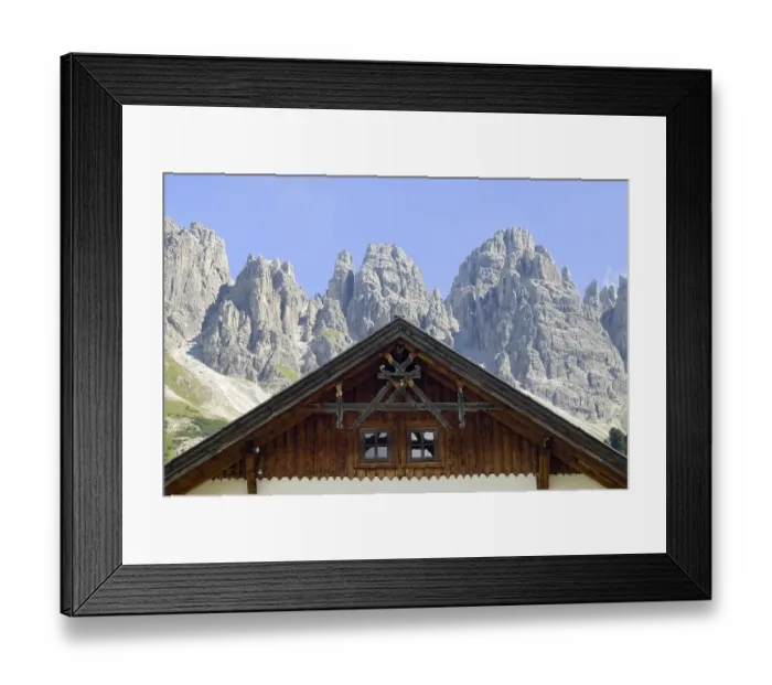 Framed Print : Gable of an alpine building, Kalkkoegel mountain chain at back