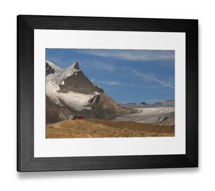 Framed Print : Fluhalp restaurant near Stellisee lake in the evening light Framed Print : Fluhalp restaurant near Stellisee lake in the evening light