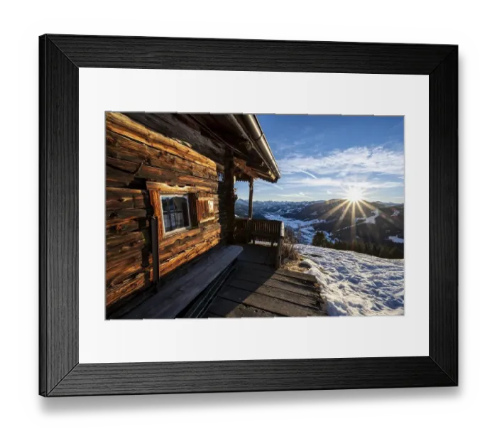Framed Print : Terrace of a mountain hut, view into the Brixen valley in winter sunshine