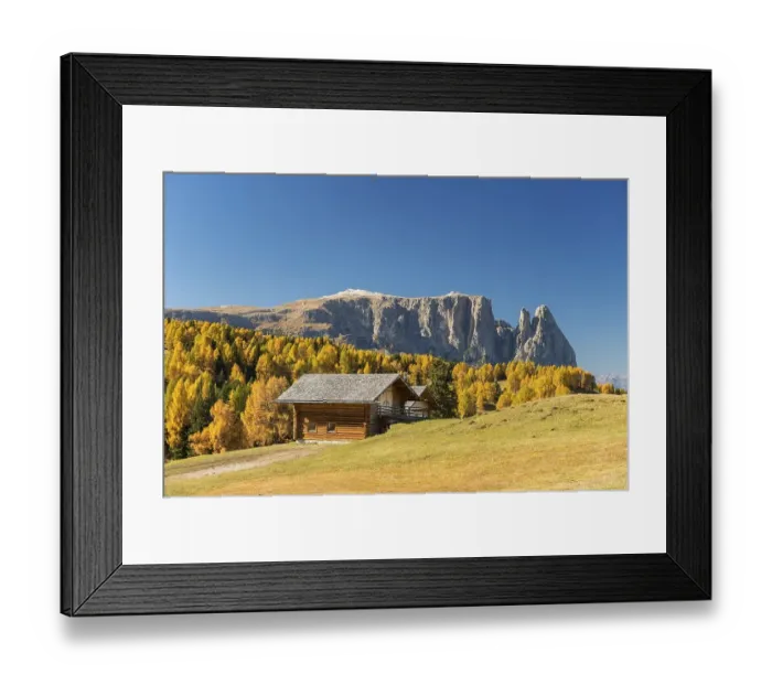 Framed Print : Autumnal Alpe di Siusi mountain pasture with view of the Sciliar massif