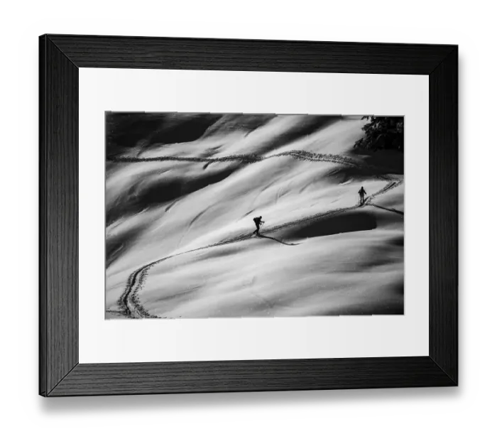 Framed Print : Ski tourers ascending in black and white Framed Print : Ski tourers ascending in black and white