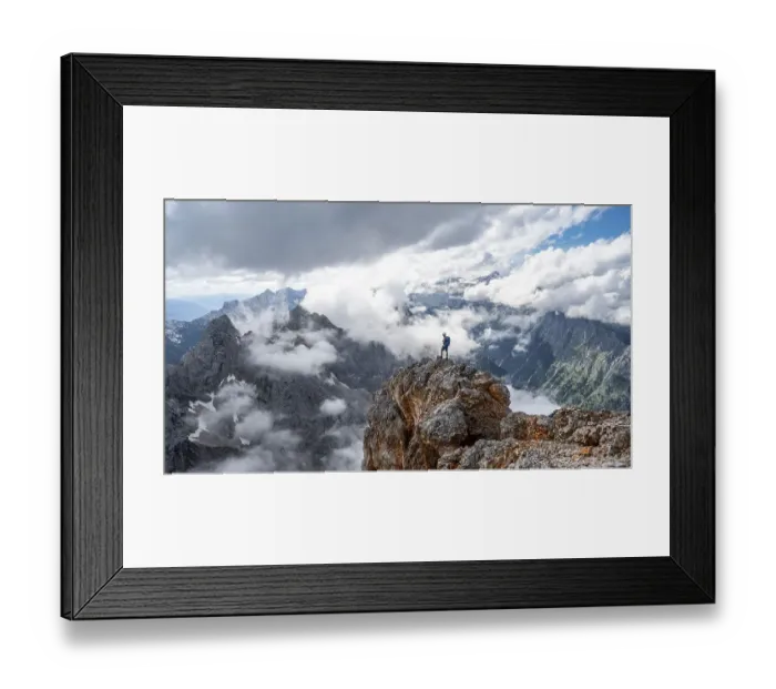 Framed Print : Hiker standing on a rock, at the summit of the Partenkirchner Dreitorspitze Framed Print : Hiker standing on a rock, at the summit of the Partenkirchner Dreitorspitze