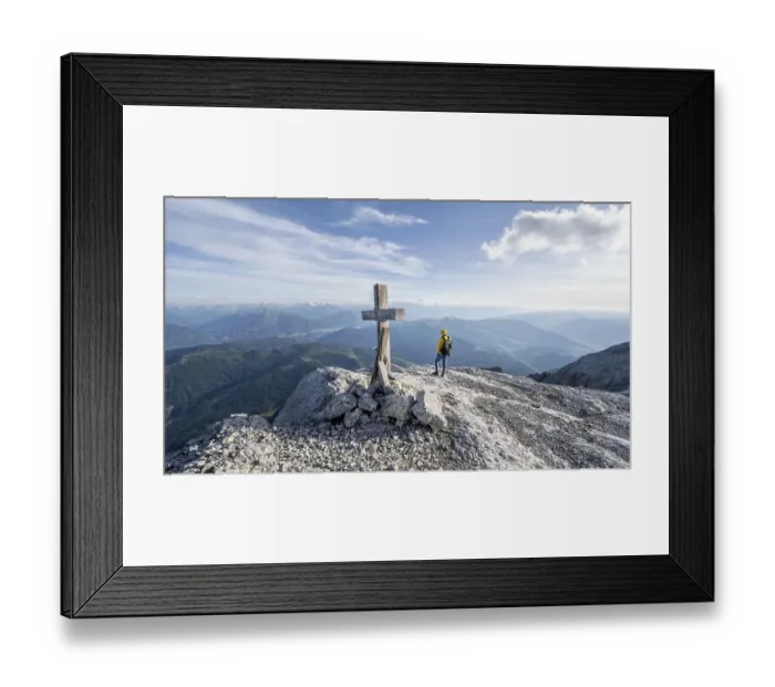 Framed Print : Mountaineer at a secondary peak of the Hochkoenig with summit cross Framed Print : Mountaineer at a secondary peak of the Hochkoenig with summit cross