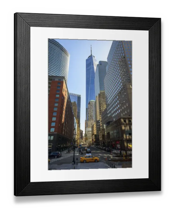 Framed Print : Typical yellow taxi, skyscrapers on Vesey Street