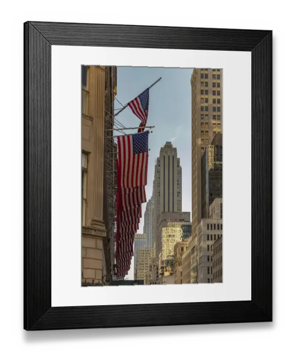 Framed Print : A picture of a row of American flags in the streets of New York