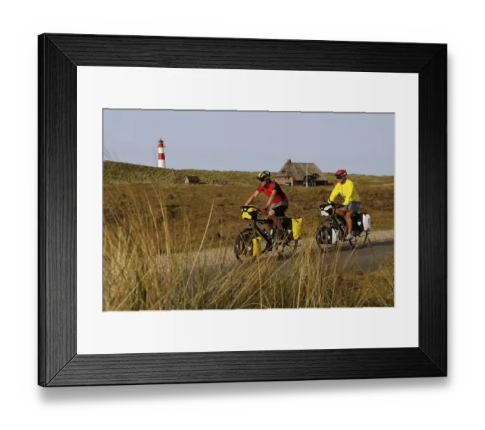 Framed Print : Cyclists in front of the Ostellenbogen Lighthouse
