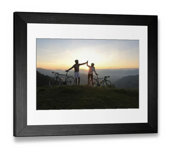 Framed Print : Couple with racing bikes, Kraftalm alp