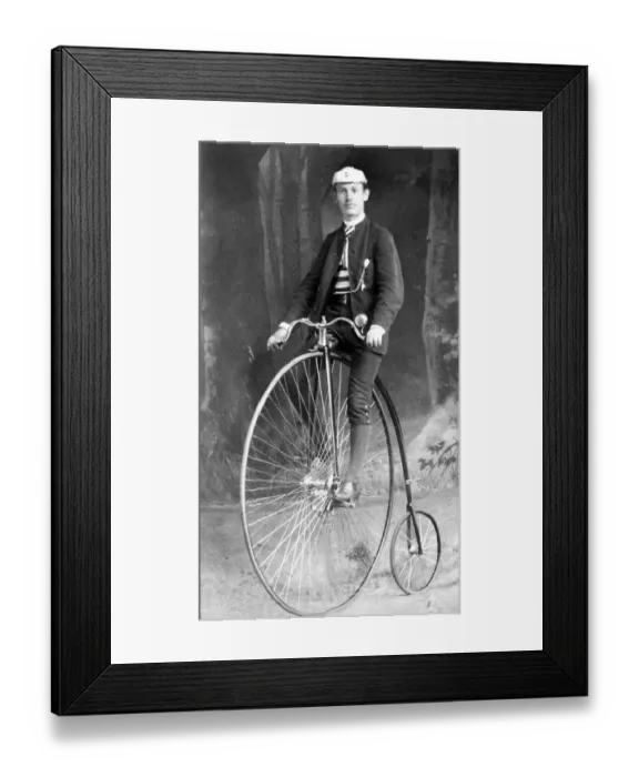 Framed Print : Historic photograph, man riding a penny-farthing