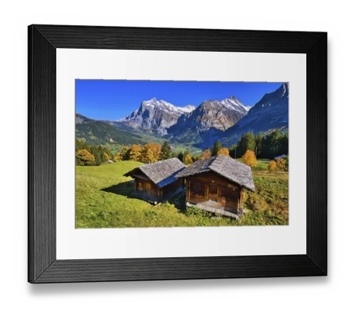 Framed Print : Wooden huts above Grindelwald, behind them Wetterhorn and Schreckhorn