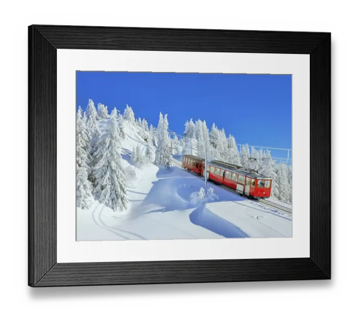 Framed Print : Cogwheel railway travelling through snow-covered forest Framed Print : Cogwheel railway travelling through snow-covered forest