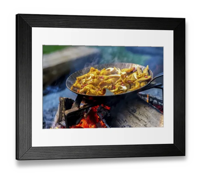Framed Print : Chanterelles in a pan over an open fire