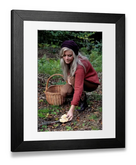 Framed Print : Young woman picking mushrooms, Ystad