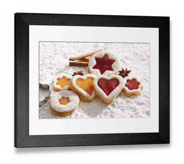 Framed Print : Short pastry jam cookies, star anise and cinnamon sticks