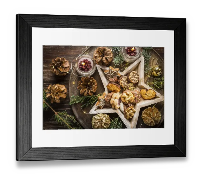 Framed Print : Variation of Christmas cookies and gingerbread with ornaments on wooden background