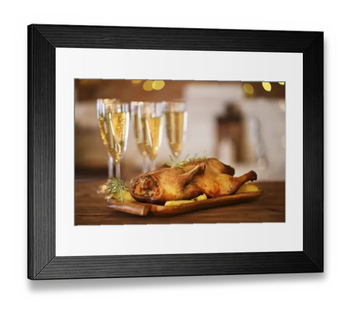 Framed Print : Christmas dinner with roast duck and champagne on wooden table