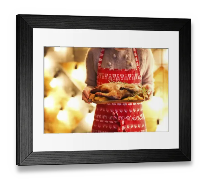 Framed Print : Roast duck and potato on wooden plate in womans hands Framed Print : Roast duck and potato on wooden plate in womans hands