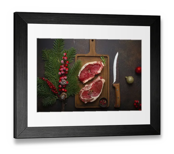 Framed Print : Two raw uncooked meat beef steaks on wooden cutting board with knife