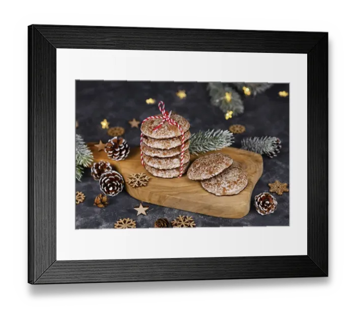 Framed Print : Stacks of traditional German round glazed gingerbread Christmas cookie called Lebkuchen