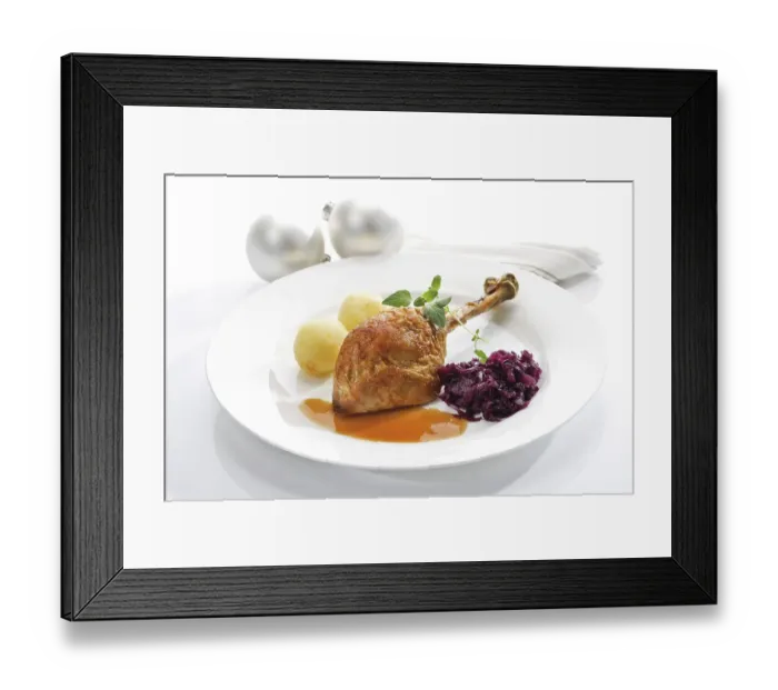 Framed Print : Roast turkey drumstick served on a white plate with red cabbage Framed Print : Roast turkey drumstick served on a white plate with red cabbage