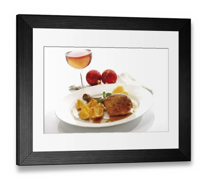 Framed Print : Roast turkey drumstick served on a white plate with orange slices