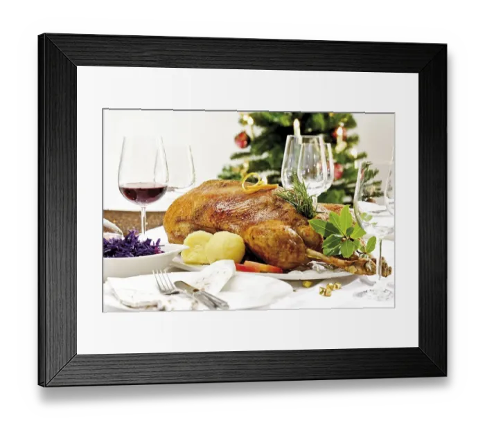 Framed Print : Roast goose, red cabbage, dumplings on a festively decorated table Framed Print : Roast goose, red cabbage, dumplings on a festively decorated table