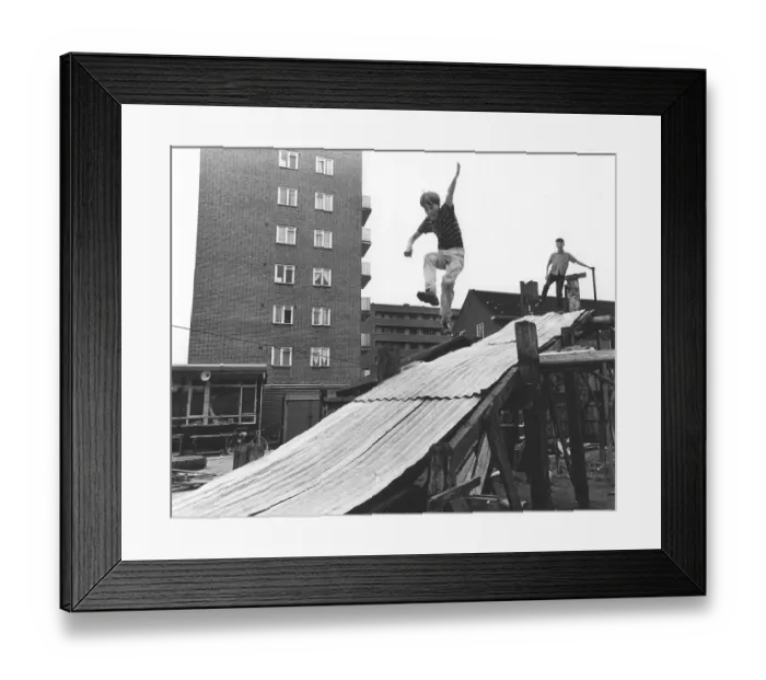 Framed Print : Boy plays on tin slide, England, Great Britain