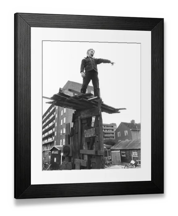 Framed Print : Boy on climbing object made of wood Framed Print : Boy on climbing object made of wood